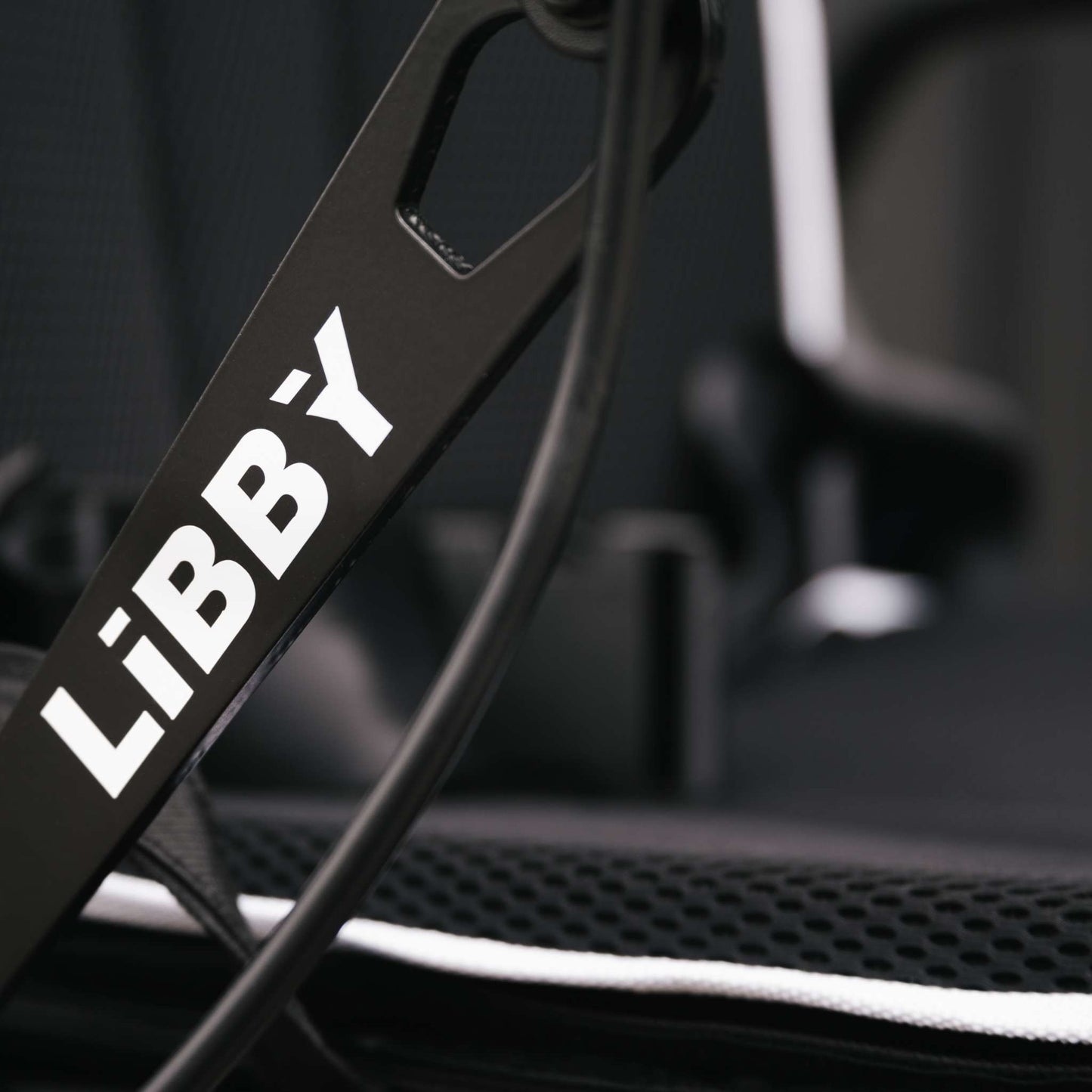 Movo logo embroidered on the Libby power wheelchair backrest