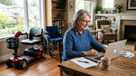 Canadian senior browsing medical equipment online at home with mobility scooter and wheelchair nearby