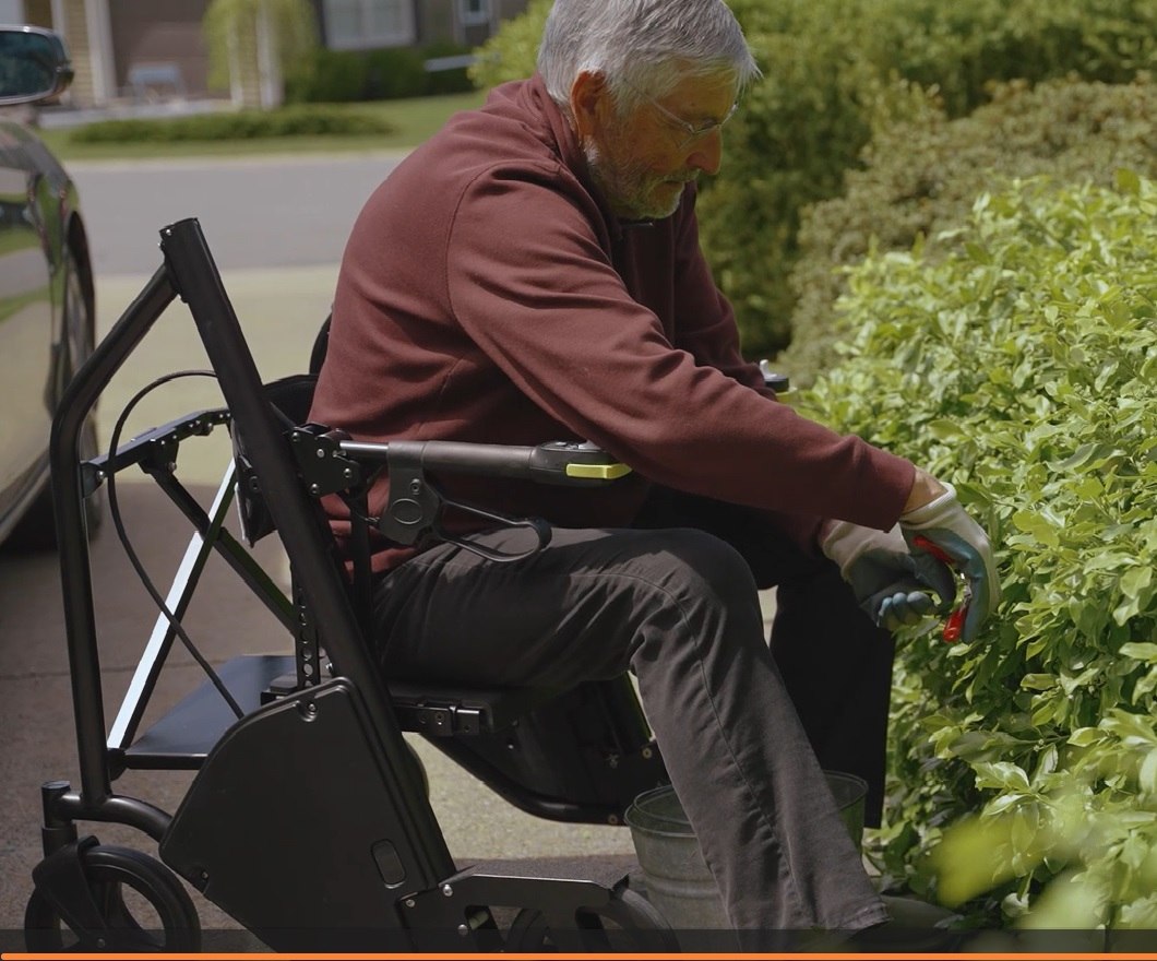 RAYMEX Lift Quattro used outdoors for gardening at ground level without kneeling