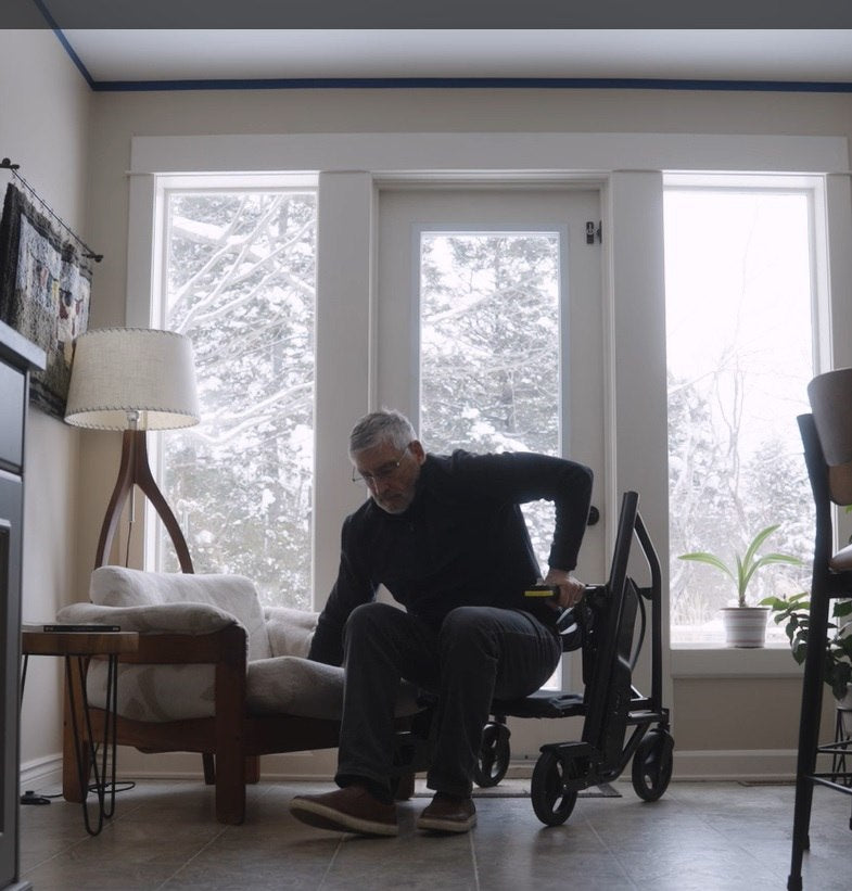 Using the RAYMEX Lift Quattro as an independent transfer aid to move from an armchair