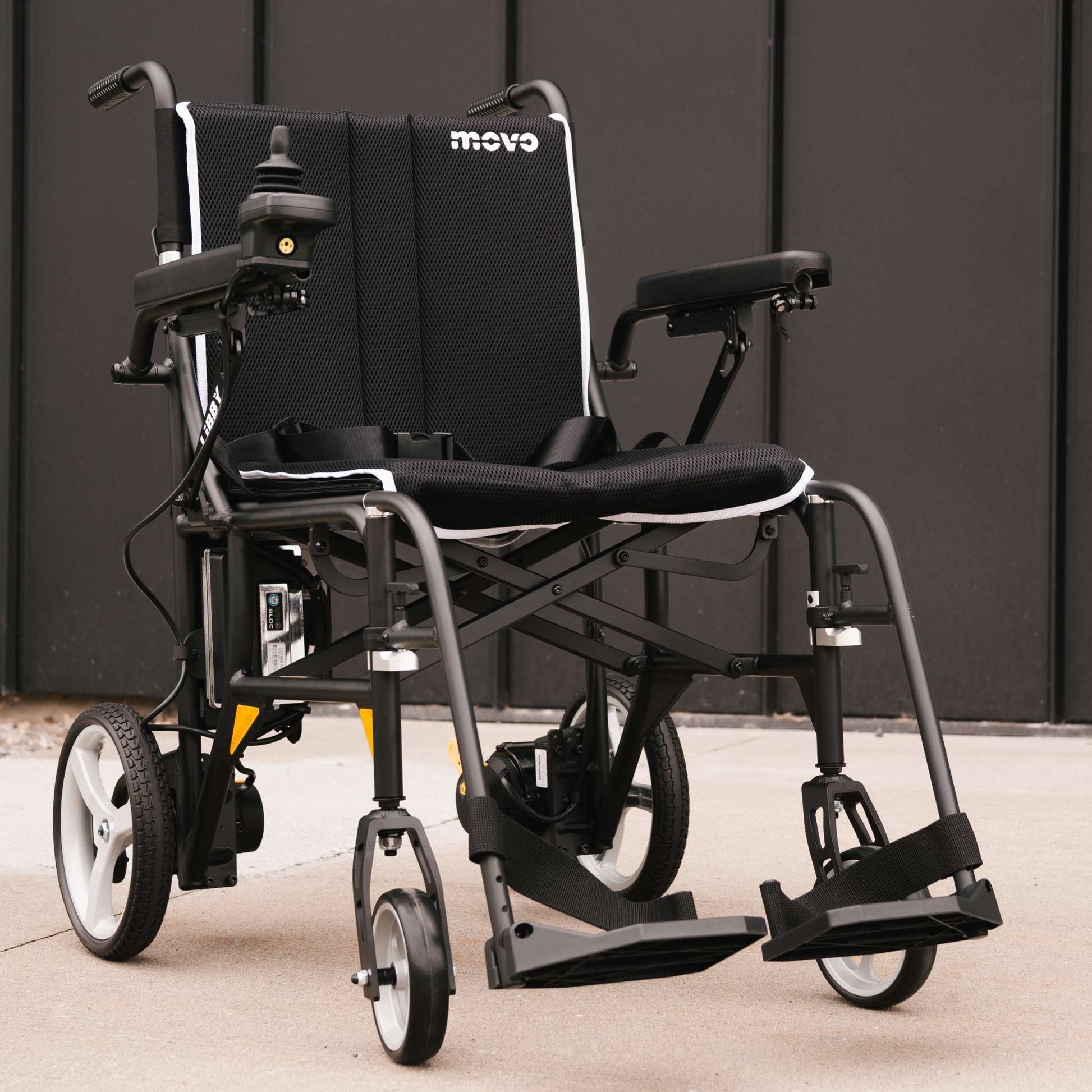 Movo Libby folding power wheelchair in black, front three-quarter view