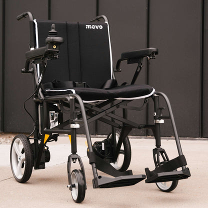 Movo Libby folding power wheelchair in black, front three-quarter view