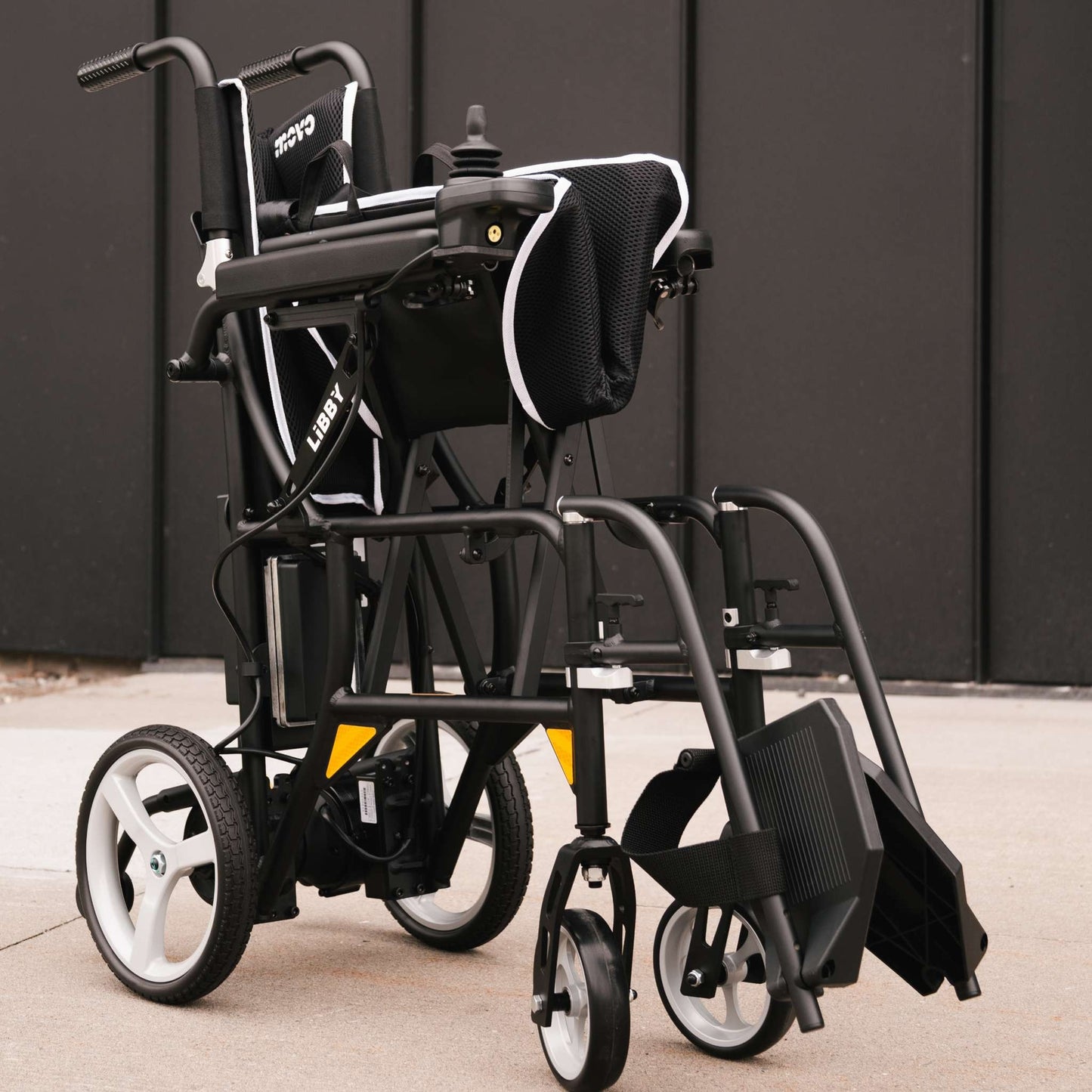 Movo Libby power wheelchair partially folded showing compact width