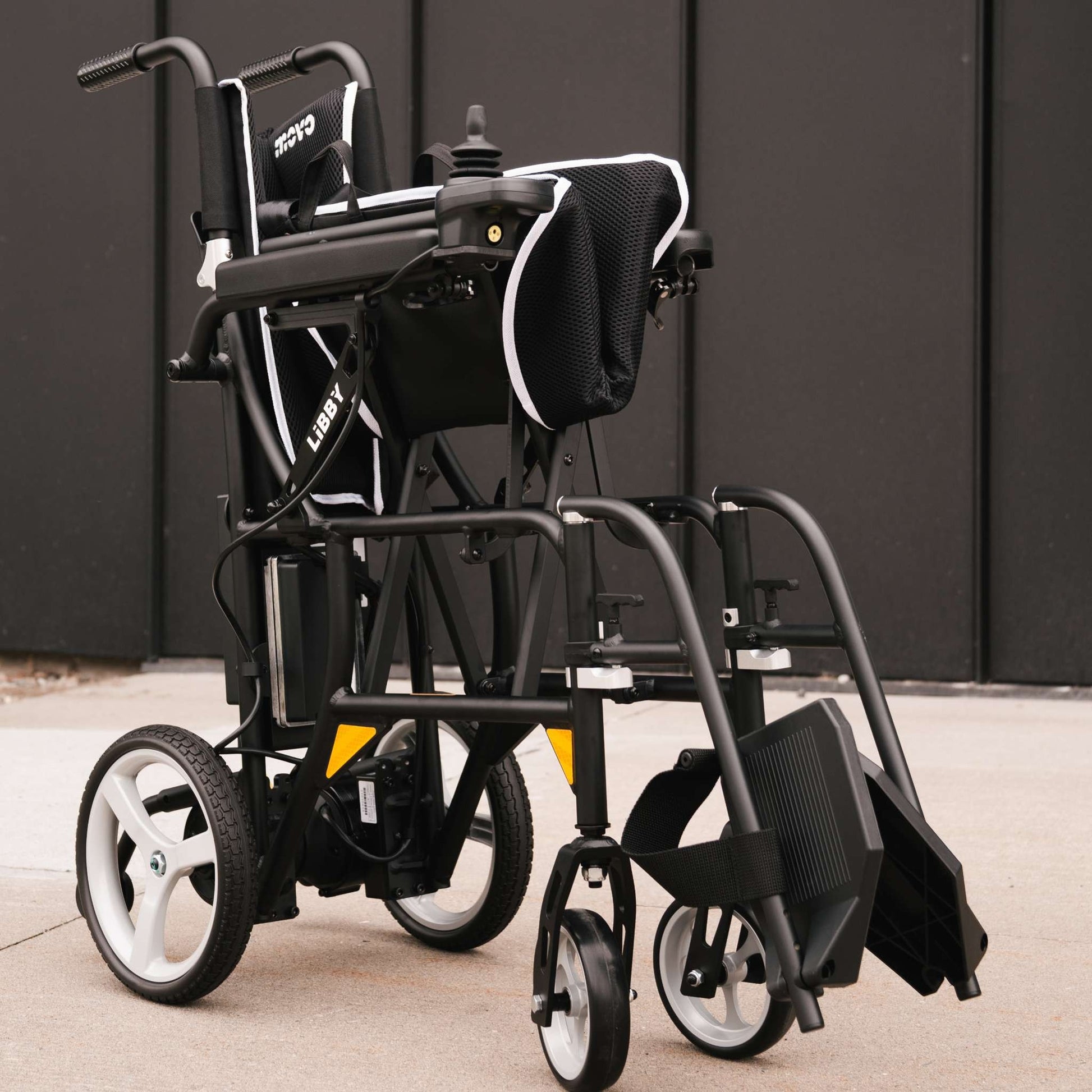 Movo Libby power wheelchair partially folded showing compact width