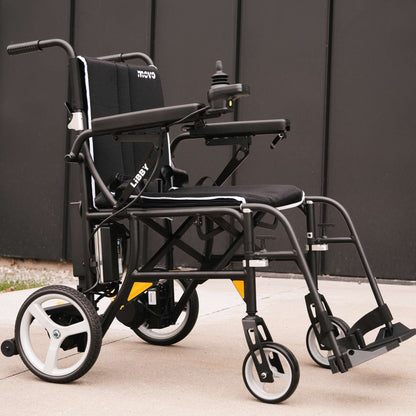 Movo Libby folding powerchair, side profile with joystick control