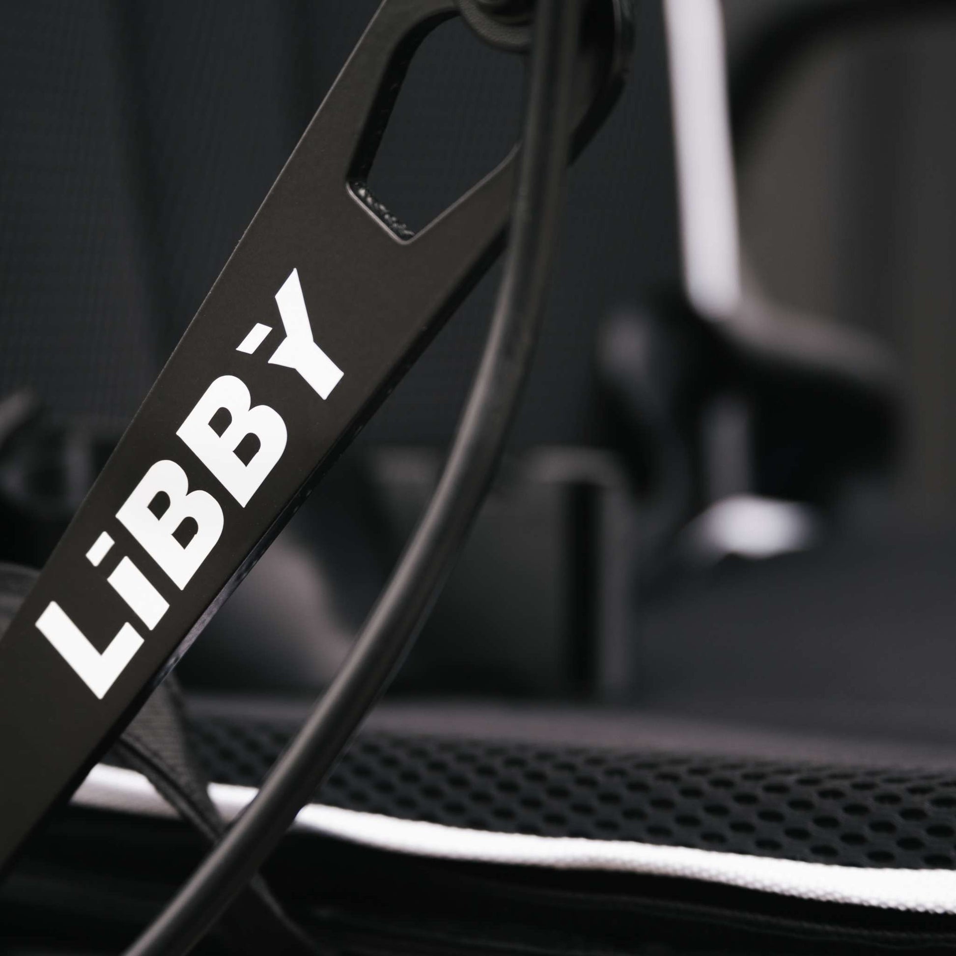 Movo logo embroidered on the Libby power wheelchair backrest