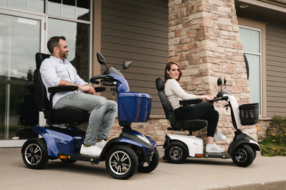 Rider on a blue Movo Sutton scooter on a paved walkway