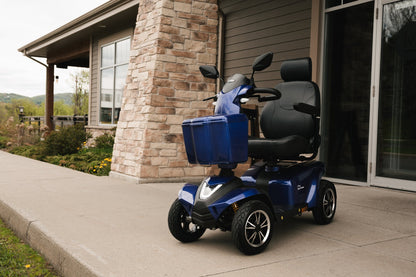 Movo Sutton blue scooter with rider, showing seat and mirror position