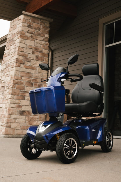 Movo Sutton blue scooter parked outdoors, three-quarter rear view