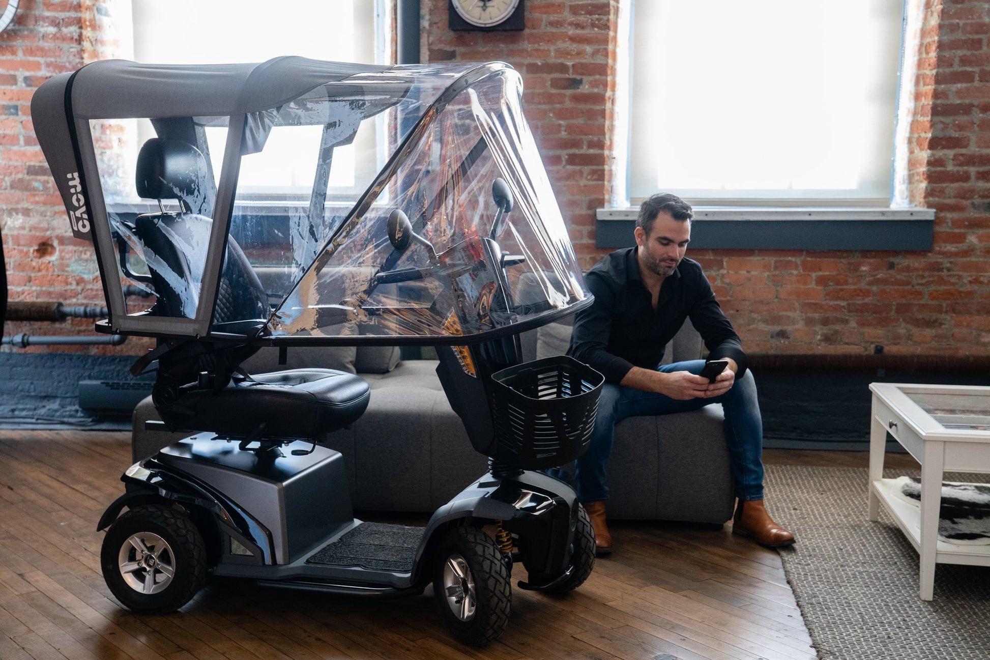 Movo Canopy extended into enclosed cabin position on a mobility scooter