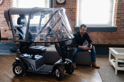 Movo Canopy extended into enclosed cabin position on a mobility scooter