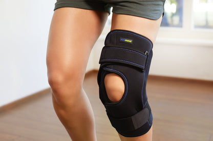 Actimove Sports Edition Knee Brace Wrap Around, Polycentric Hinges, Condyle Pads