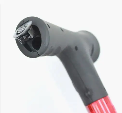 Flashlight cane battery slot